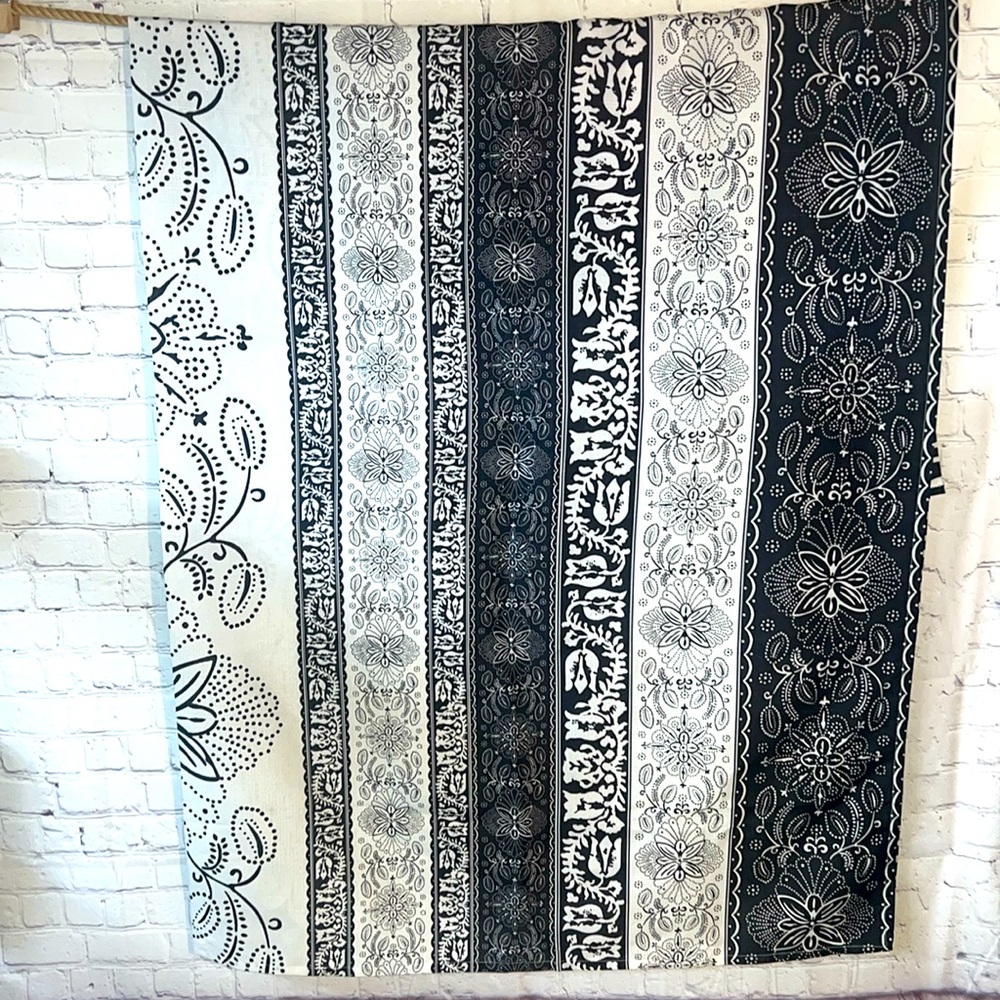 Shower curtain in next to new condition. Black and white.